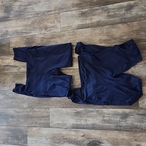 2 pairs of navy leggings with pockets